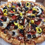Big M's Pizzeria signature dishes Cheese PizzaPepperoni PizzaGarlic KnotsCalzones